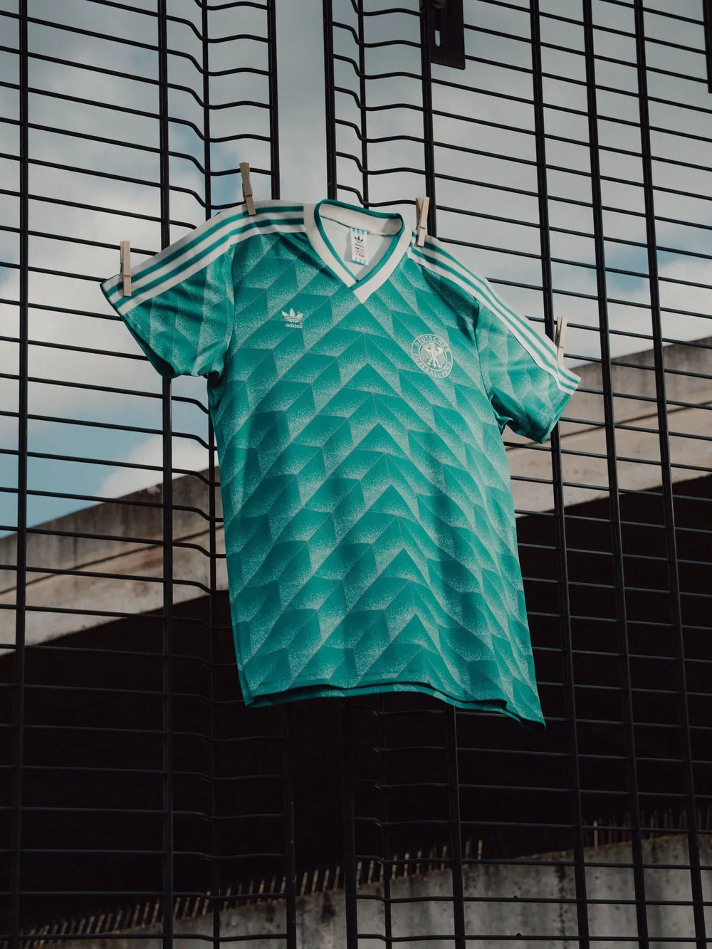 Germany 1990 away remake jersey hanging outdoors